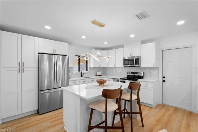 $995,000 | 731 102nd Avenue North, Naples, FL 34108