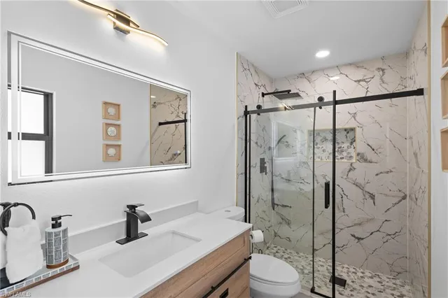 $995,000 | 731 102nd Avenue North, Naples, FL 34108