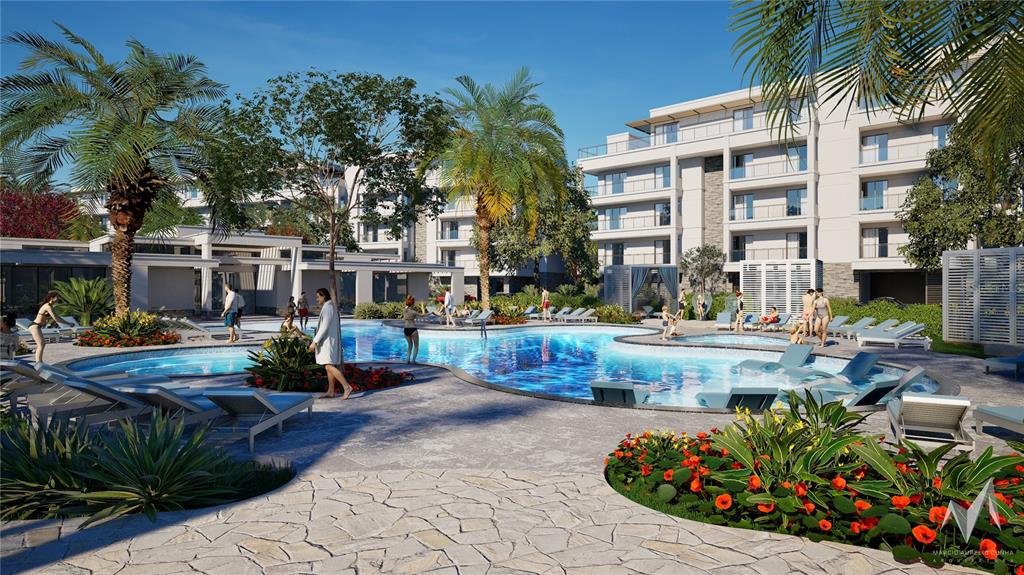 10009 Crisbert Ct Road, Unit 504E Orlando, FL 32836 - Photo 8 of 14 a view of a swimming pool with a patio