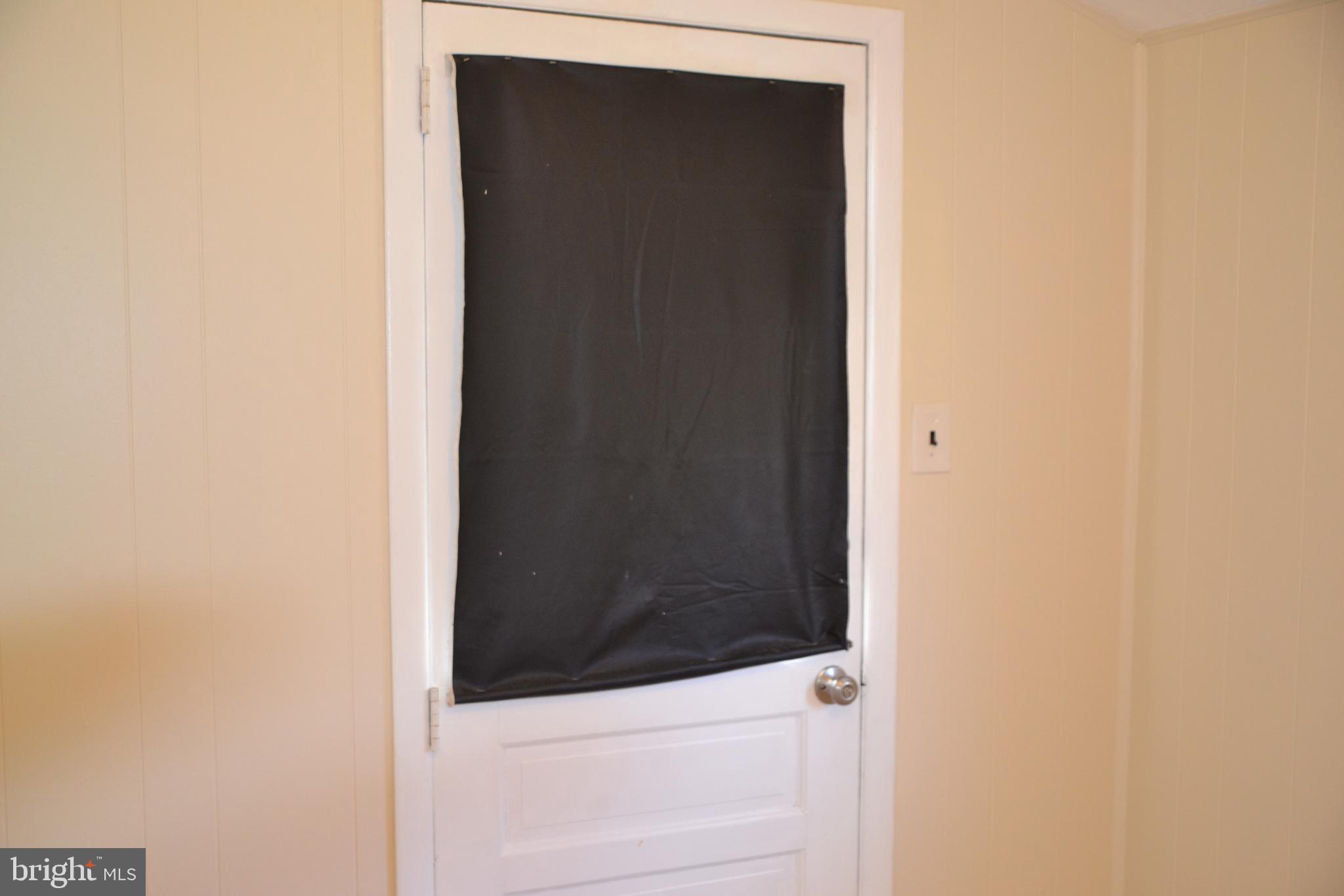 162 Burmont Road Drexel Hill, PA 19026 - Photo 20 of 42 a bathroom with a door