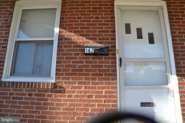 a brick building with a window