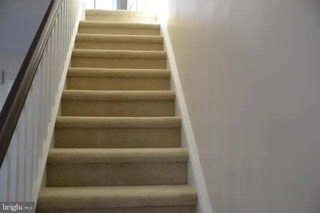 a view of a room that has a window in it