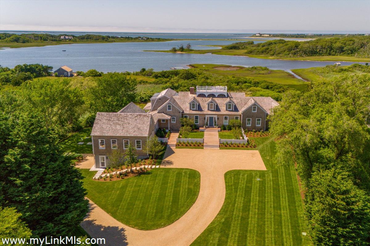 256 Polpis Road Nantucket, MA 02554 - Photo 28 of 30 a view of a swimming pool with a lake view