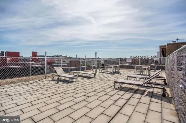 a view of a terrace with sitting area
