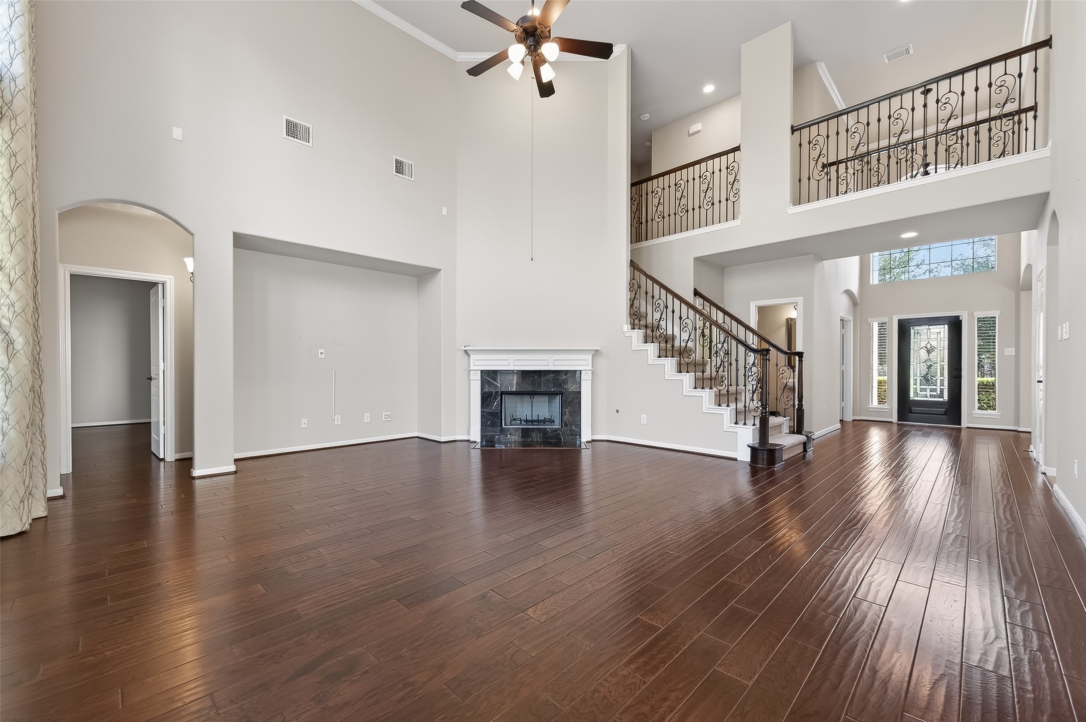 22 North Arrow Canyon Circle Spring, TX 77389 - Photo 15 of 50 a view of an entryway with wooden floor and stairs