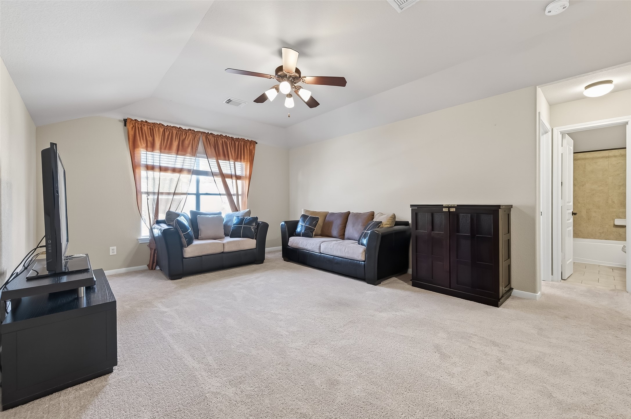 22 North Arrow Canyon Circle Spring, TX 77389 - Photo 23 of 50 a living room with furniture and a flat screen tv