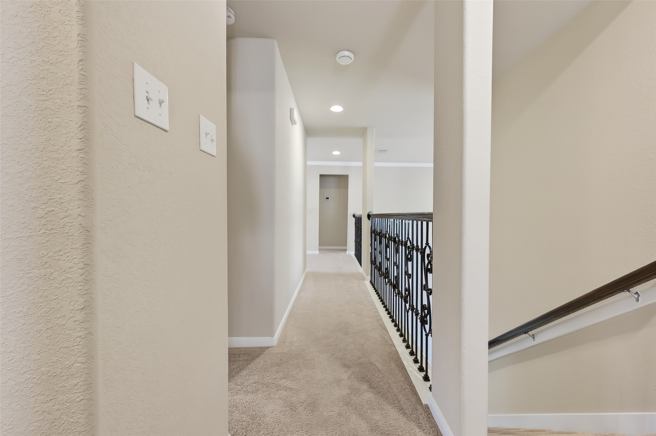 22 North Arrow Canyon Circle Spring, TX 77389 - Photo 24 of 50 a hallway with wooden floor windows and stairs