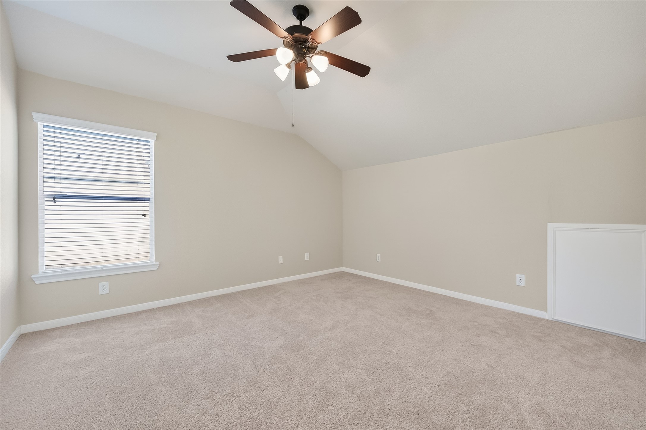 22 North Arrow Canyon Circle Spring, TX 77389 - Photo 26 of 50 an empty room with a window and a fan