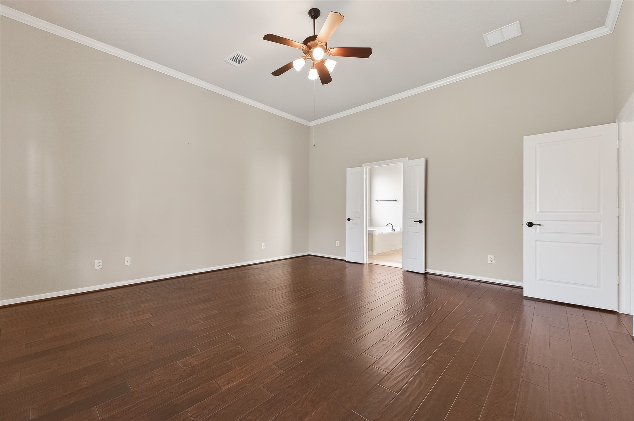 22 North Arrow Canyon Circle Spring, TX 77389 - Photo 37 of 50 a view of an empty room with window and wooden floor