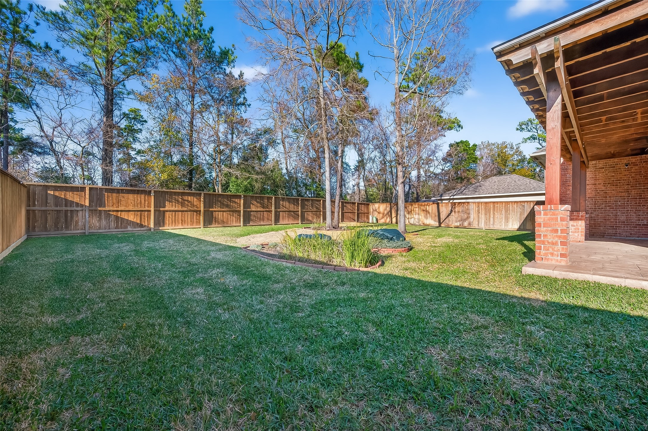 22 North Arrow Canyon Circle Spring, TX 77389 - Photo 48 of 50 a view of a house with a backyard