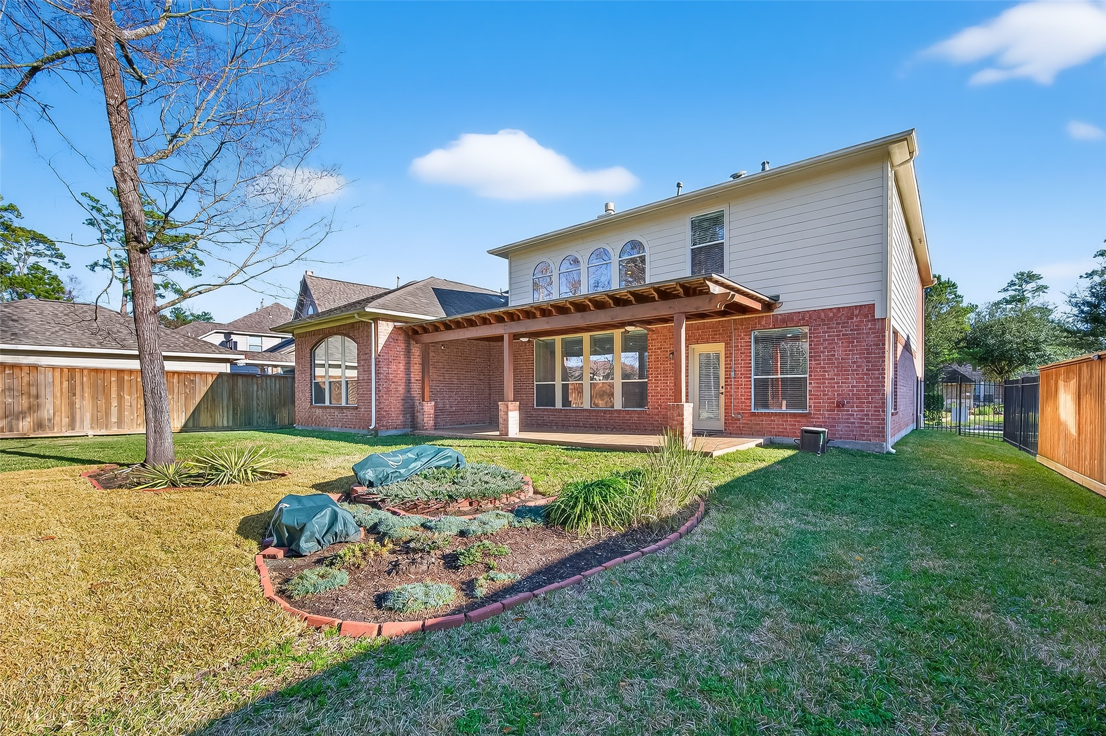 22 North Arrow Canyon Circle Spring, TX 77389 - Photo 49 of 50 a view of a house with a yard