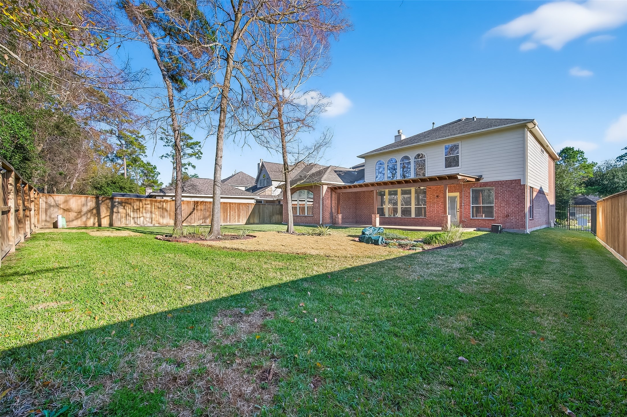22 North Arrow Canyon Circle Spring, TX 77389 - Photo 50 of 50 a front view of a house with garden