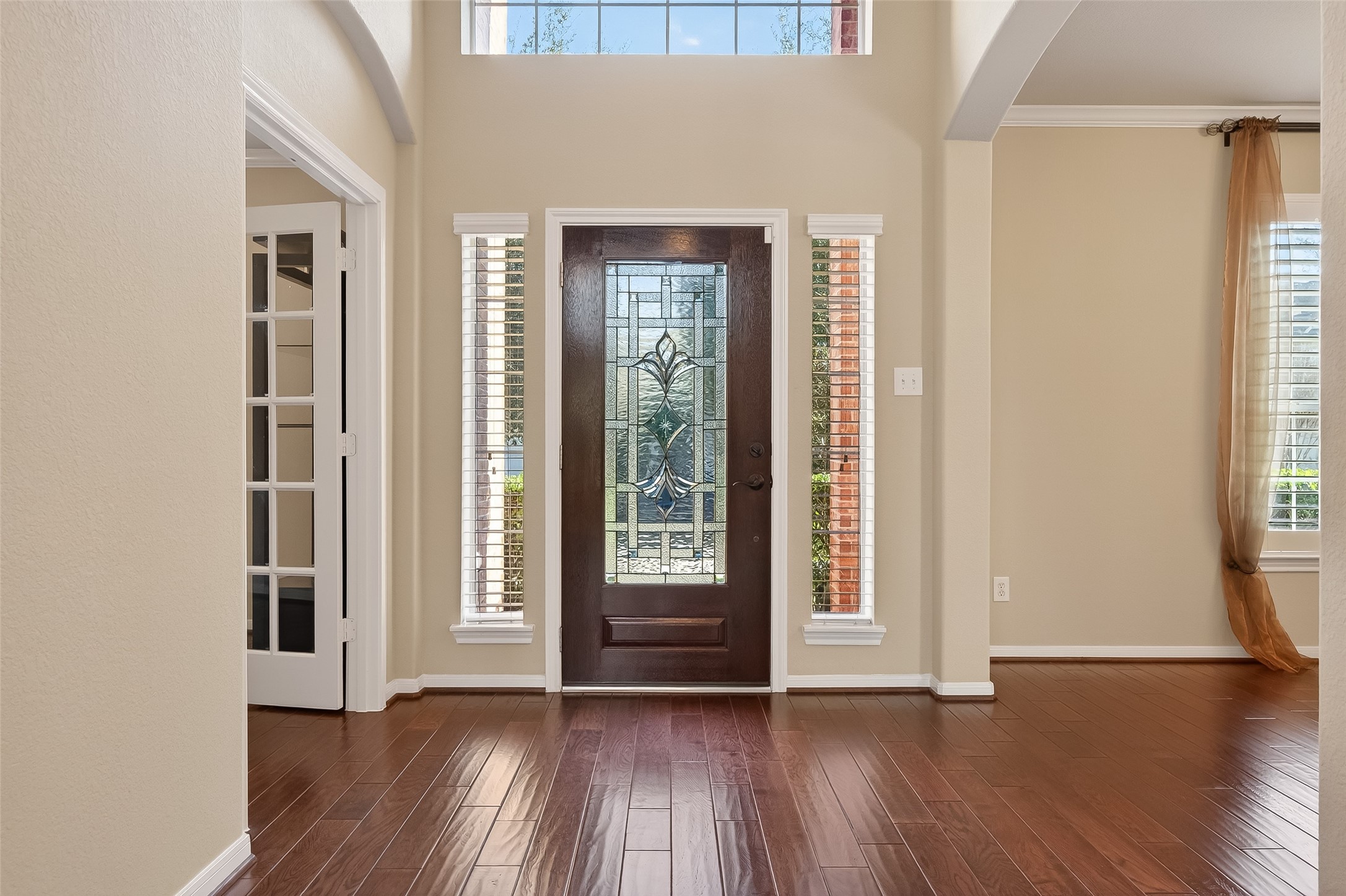 22 North Arrow Canyon Circle Spring, TX 77389 - Photo 5 of 50 a view of a room with wooden floor and doors