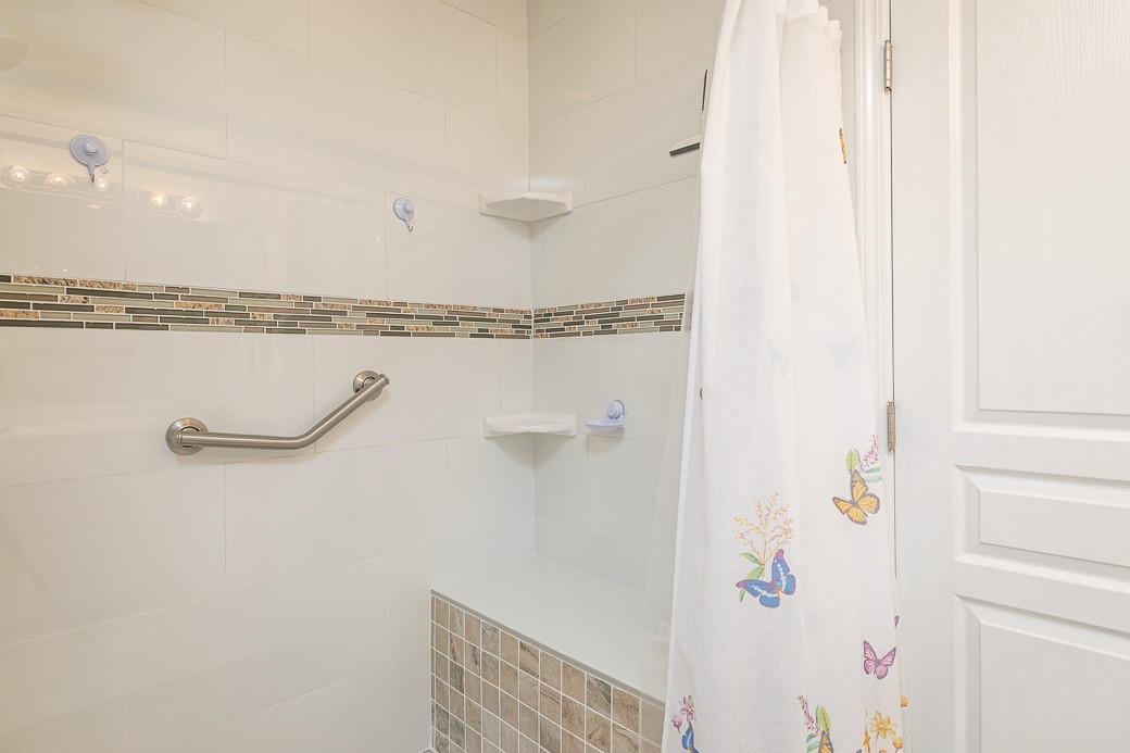 4834 Sir Duncan Way Raleigh, NC 27612 - Photo 16 of 27 Upgraded walk-in shower with gorgeous tile work and shower seat! Master Bath/Spa