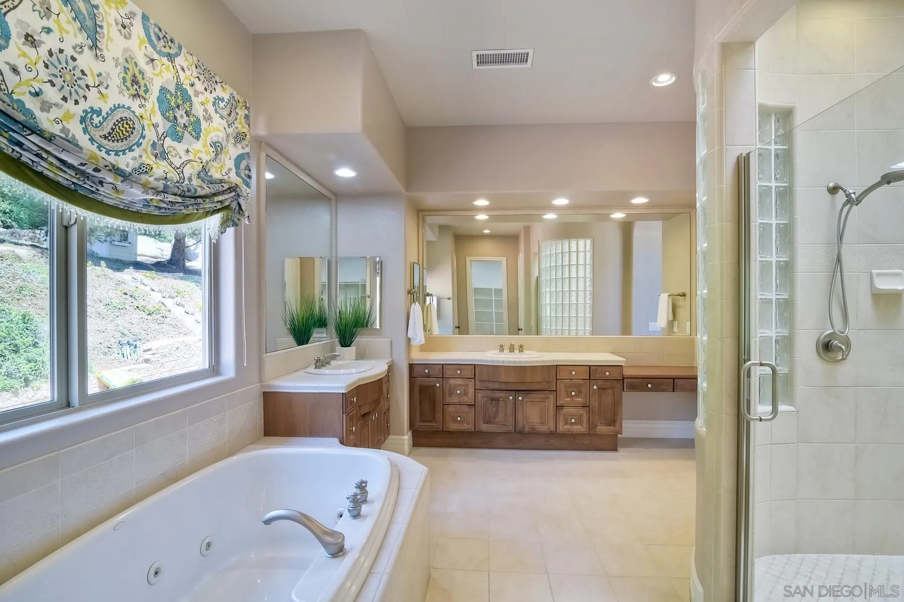 14050 Lake Poway Road Poway, CA 92064 - Photo 18 of 29 a large spacious bathroom with a large tub shower and windows