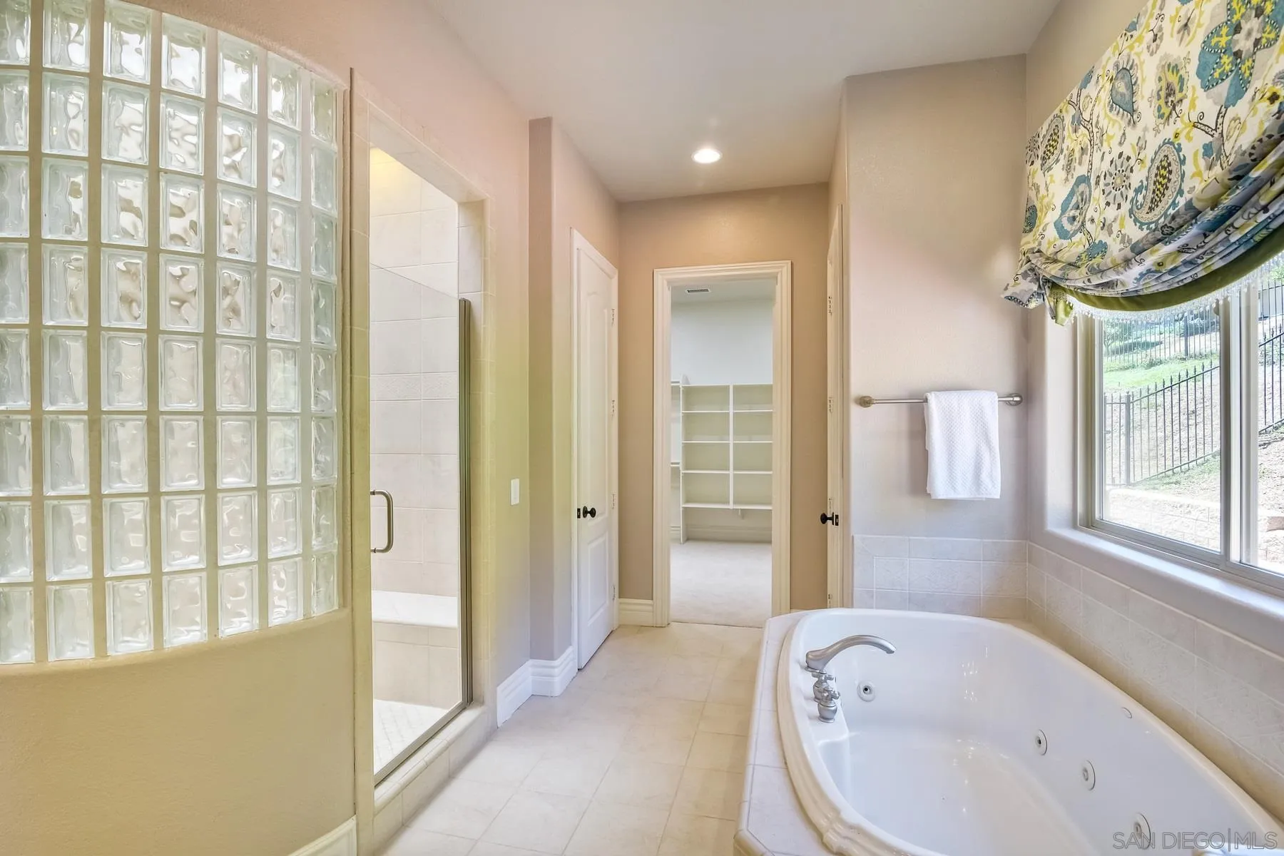 14050 Lake Poway Road Poway, CA 92064 - Photo 19 of 29 a bathroom with a tub sink and shower