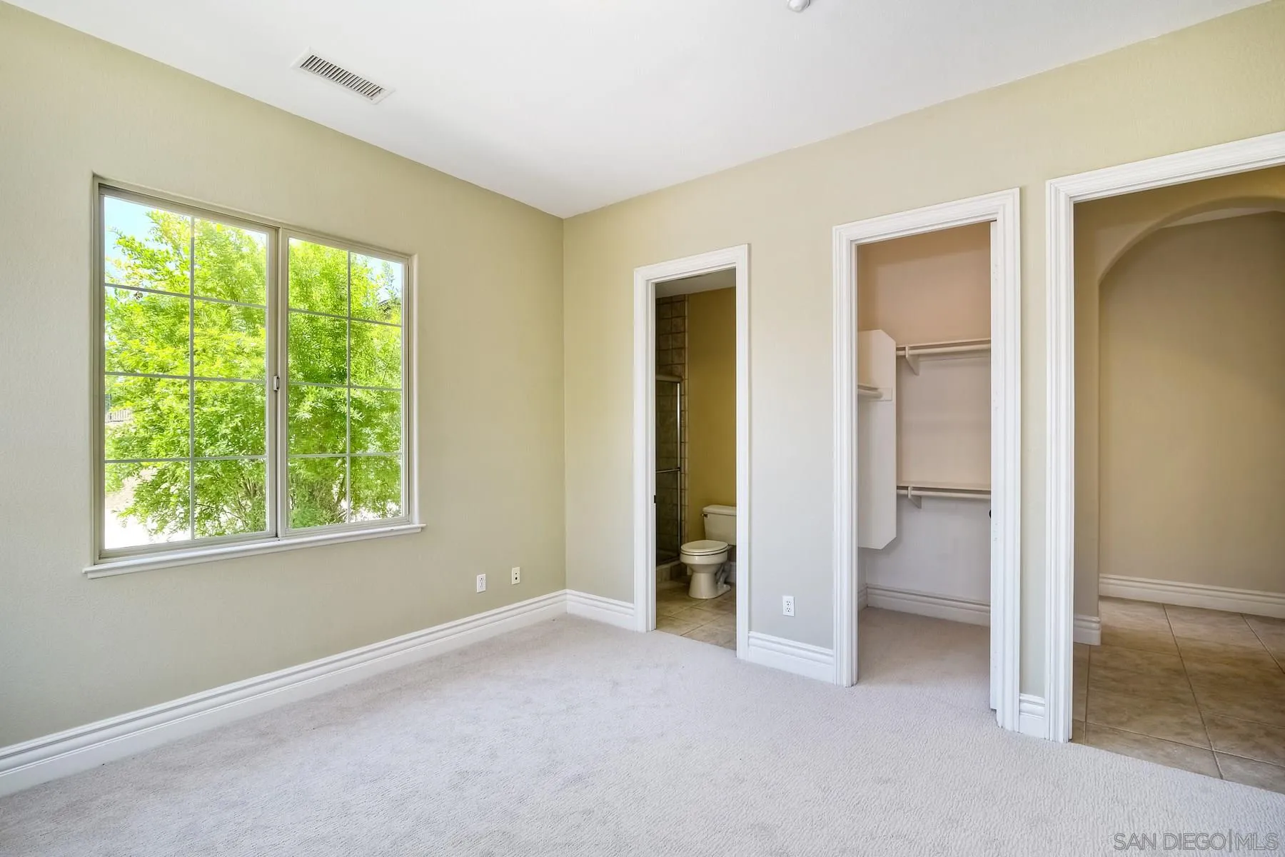 14050 Lake Poway Road Poway, CA 92064 - Photo 20 of 29 a view of a room with a large window and an empty room