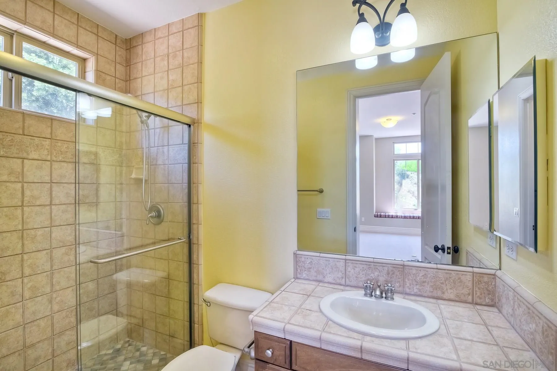 14050 Lake Poway Road Poway, CA 92064 - Photo 21 of 29 a bathroom with a sink toilet and shower