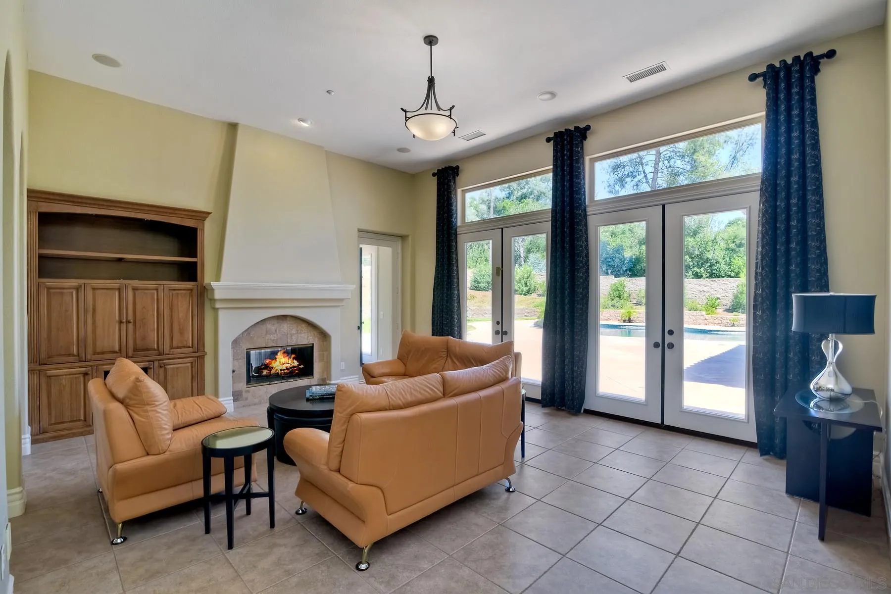 14050 Lake Poway Road Poway, CA 92064 - Photo 7 of 29 a living room with furniture and a fireplace