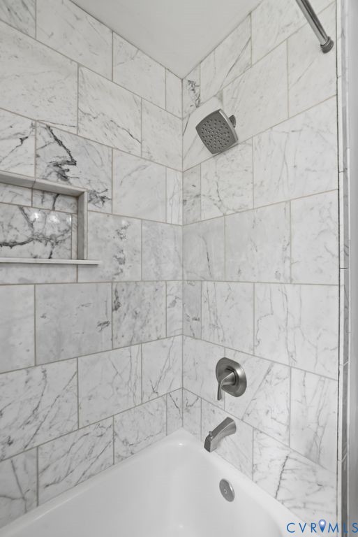 3200 Manorcrest Road Richmond, VA 23234 - Photo 23 of 34 a bathroom with a bathtub and shower