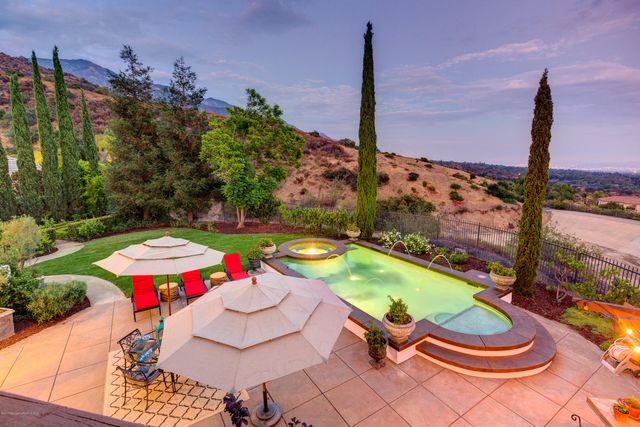 a wooden bench sitting in the middle of a park
