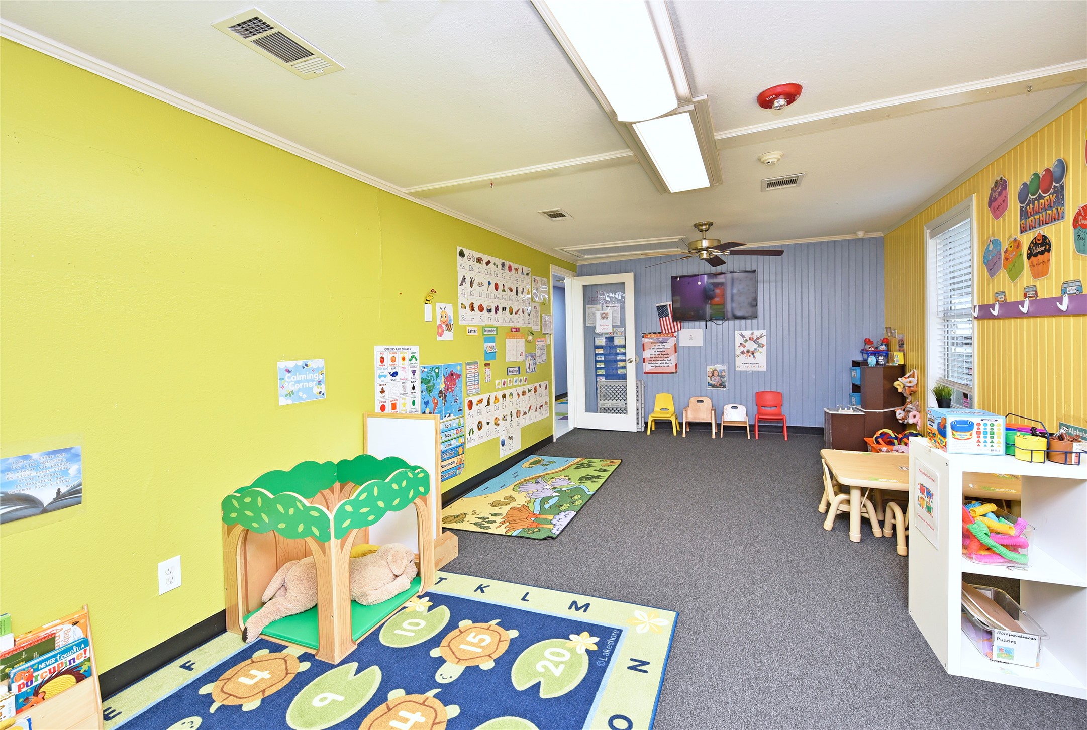 1220 Mulcahy Street Rosenberg, TX 77471 - Photo 30 of 41 a living room with furniture and a flat screen tv