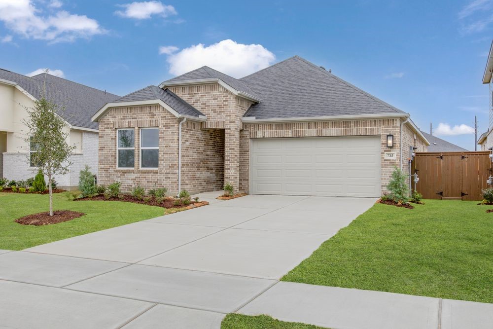 735 Willow Grove Lane Rosenberg, TX 77471 - Photo 1 of 26 a front view of house with yard