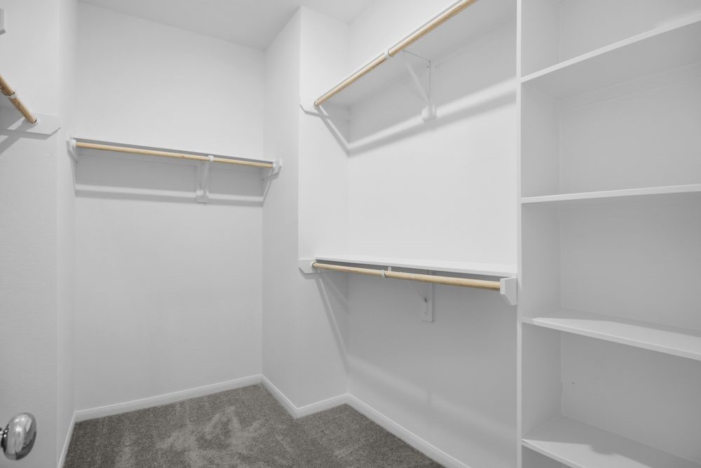 735 Willow Grove Lane Rosenberg, TX 77471 - Photo 14 of 26 a view of an empty walk in closet