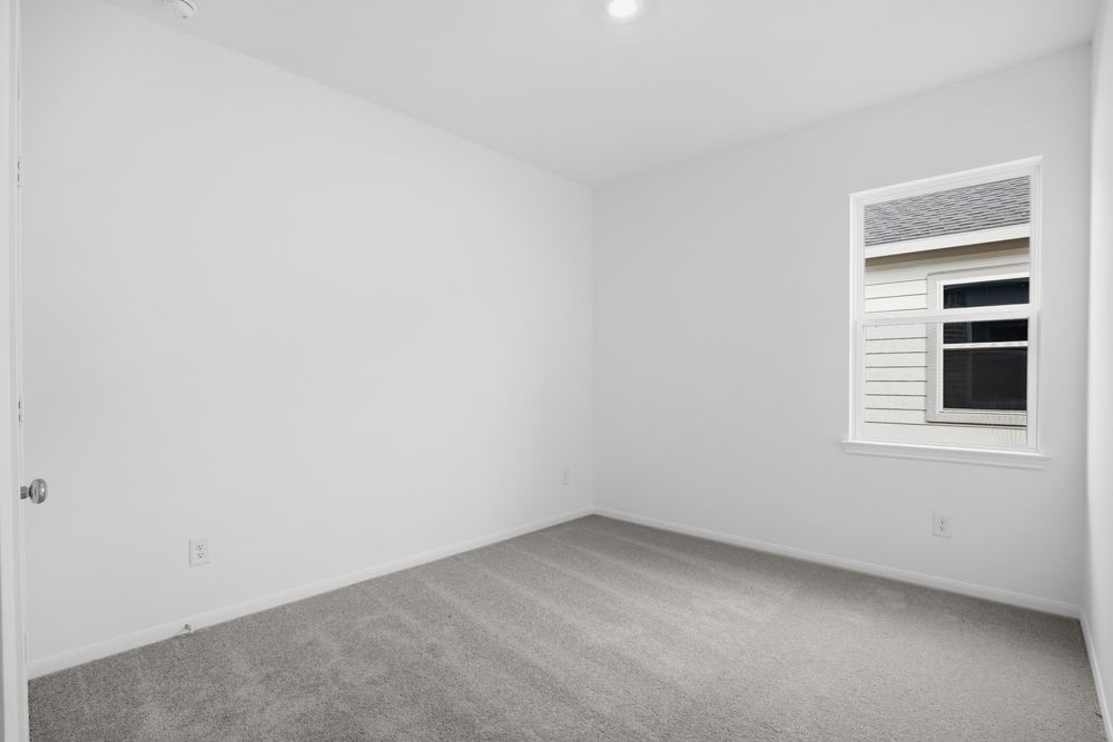 735 Willow Grove Lane Rosenberg, TX 77471 - Photo 15 of 26 a view of an empty room with a window