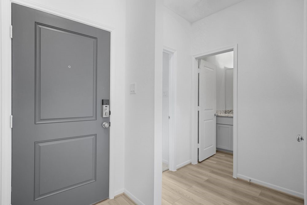 735 Willow Grove Lane Rosenberg, TX 77471 - Photo 18 of 26 a view of a hallway with wooden floor