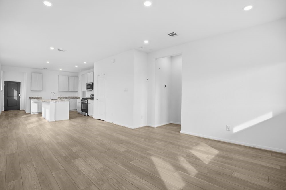 735 Willow Grove Lane Rosenberg, TX 77471 - Photo 8 of 26 a view of kitchen with kitchen island and stainless steel appliances