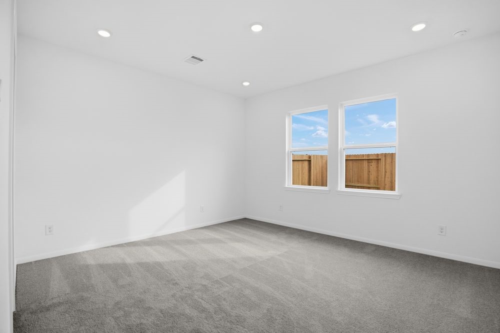 735 Willow Grove Lane Rosenberg, TX 77471 - Photo 10 of 26 an empty room with windows