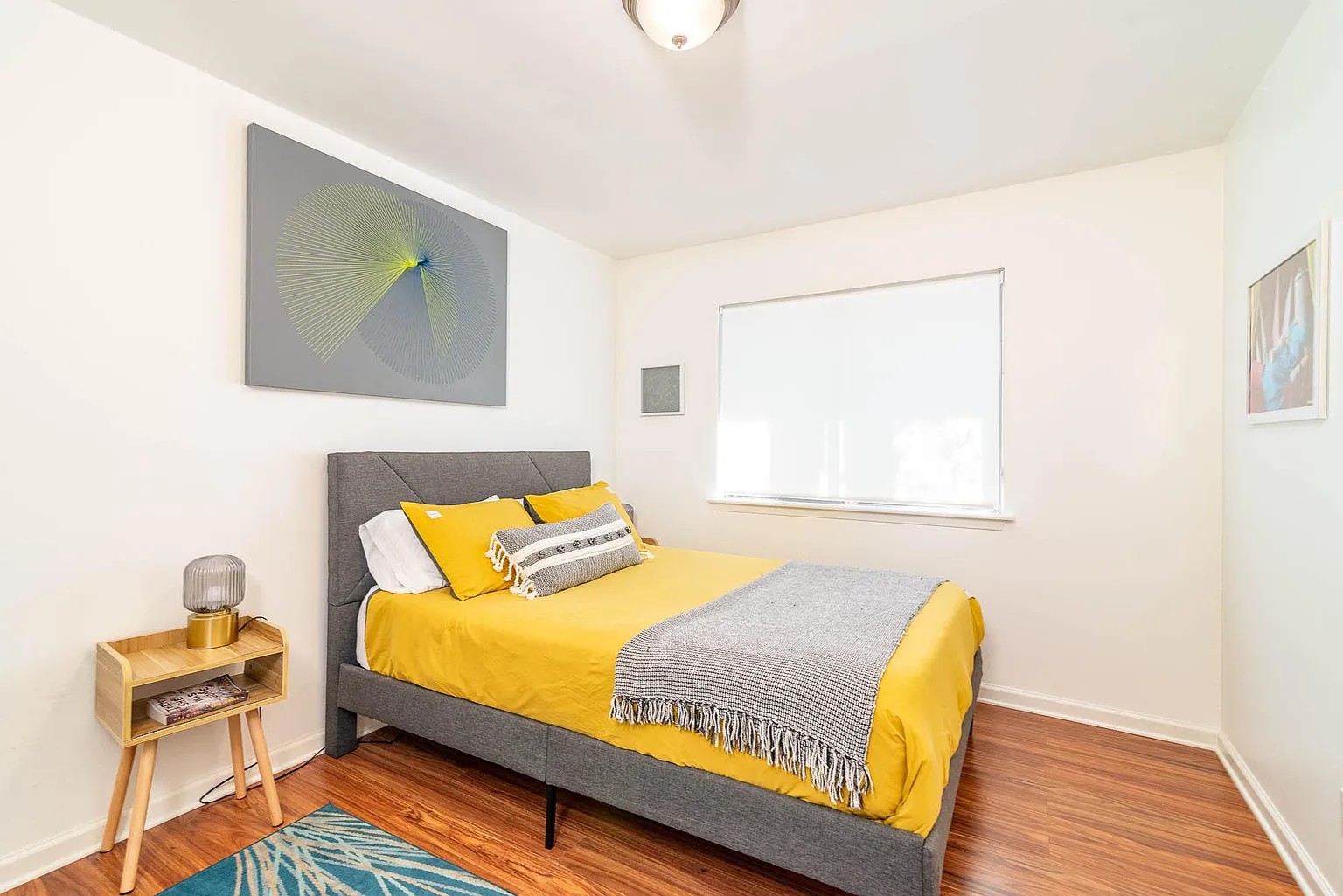 5405 Brompton Circle, Unit B Austin, TX 78745 - Photo 11 of 19 Bedroom with wood finished floors and baseboards