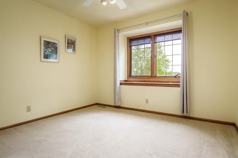 8833 West Ridge Drive Belvidere, IL 61008 - Photo 53 of 65 an empty room with a window