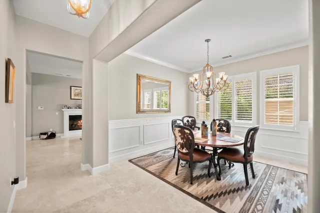 a view of a dining room with furniture