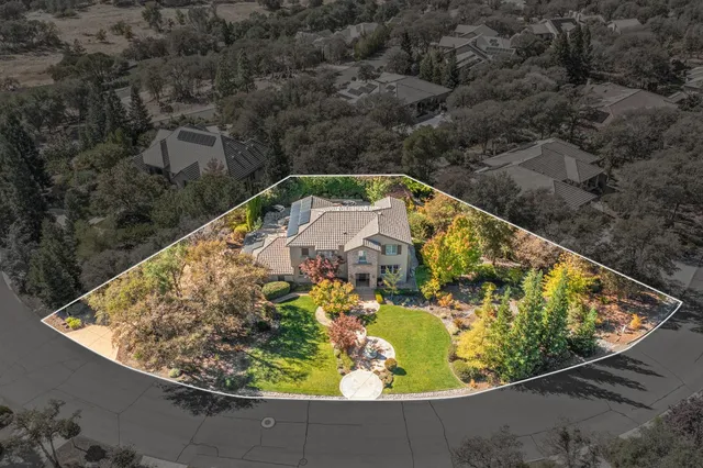 a view of a house with a yard porch and sitting area