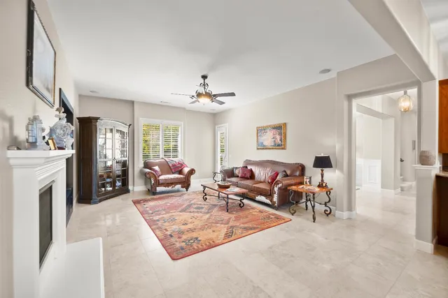 a living room with furniture and a window