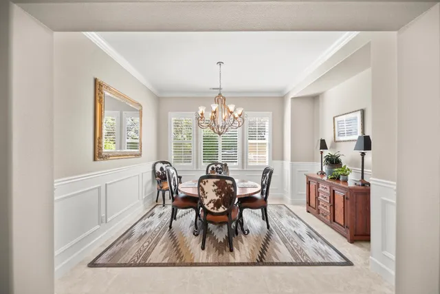 a spacious bathroom with a double vanity sink and a mirror