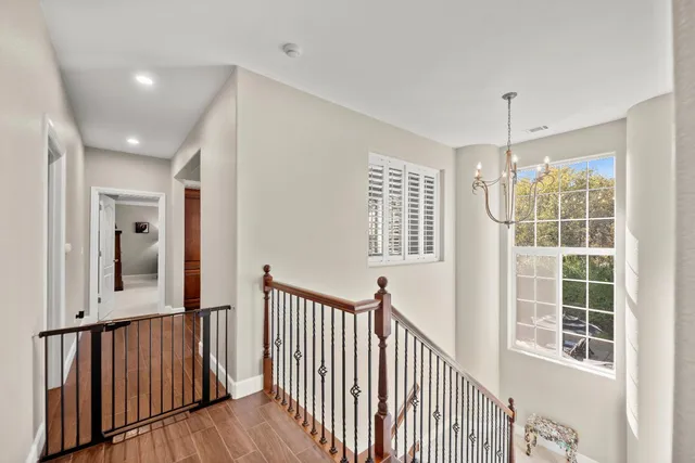 a spacious bathroom with a granite countertop tub sink and mirror