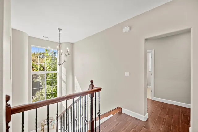 a bathroom with a sink a mirror and shower