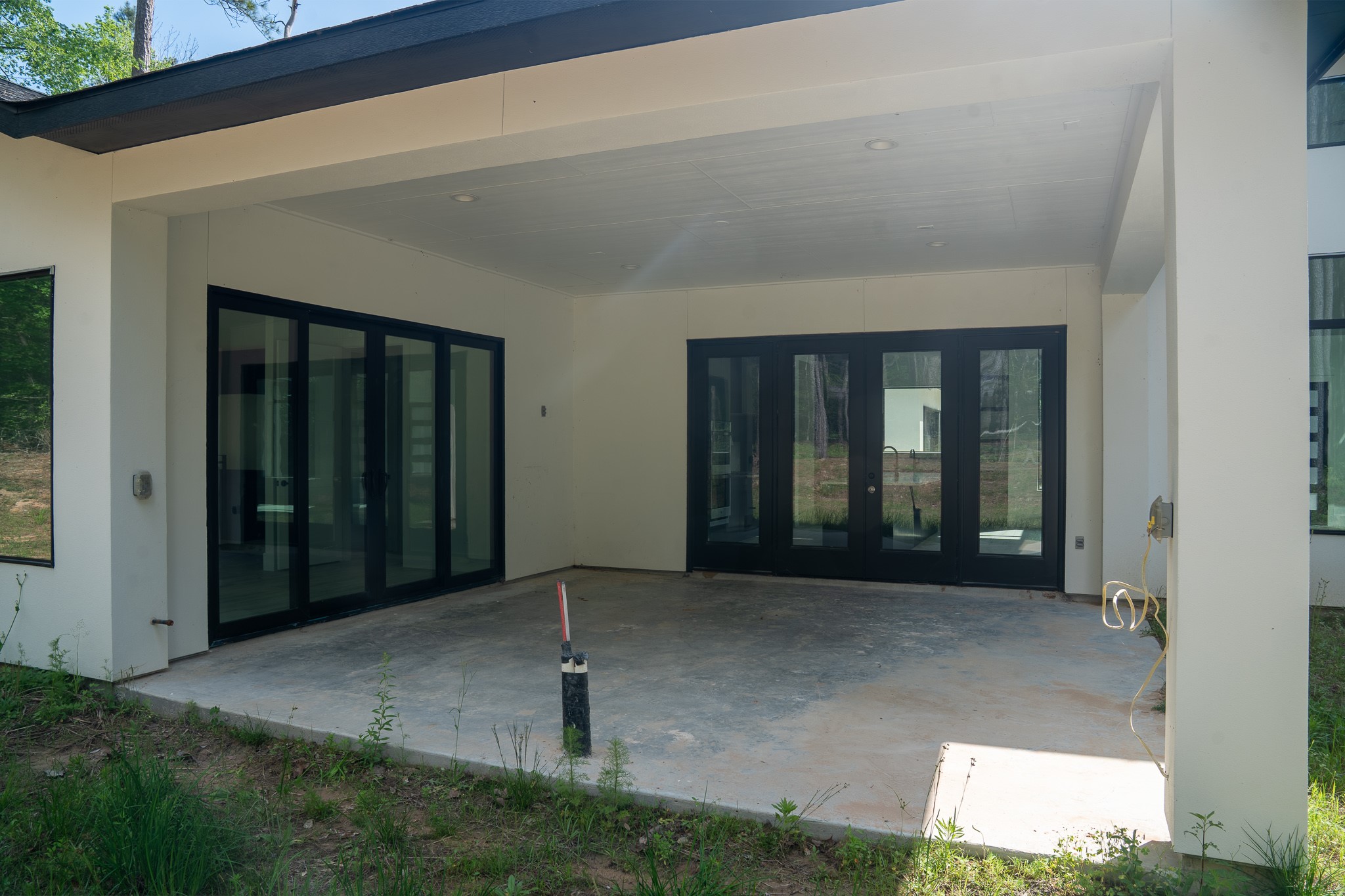 343 Sundog Road Huntsville, TX 77340 - Photo 33 of 37 18'x17'.8" covered patio, plumbed with gas, electricity, and water, ready for your outdoor kitchen.