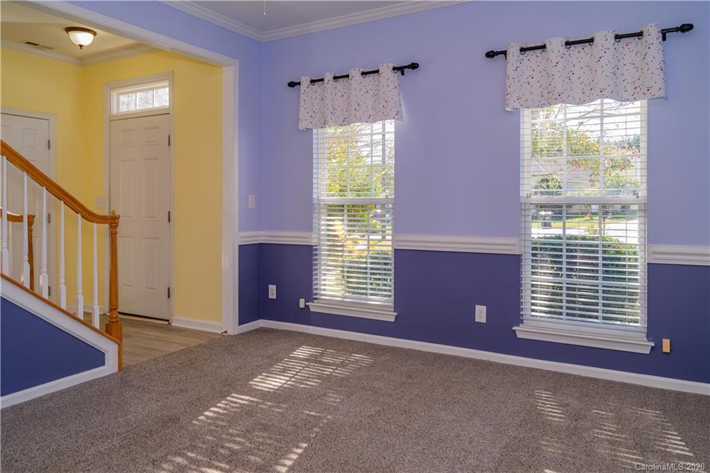 2018 Fairburn Court Fort Mill, SC 29708 - Photo 8 of 25 a view of a livingroom with a window and a fireplace