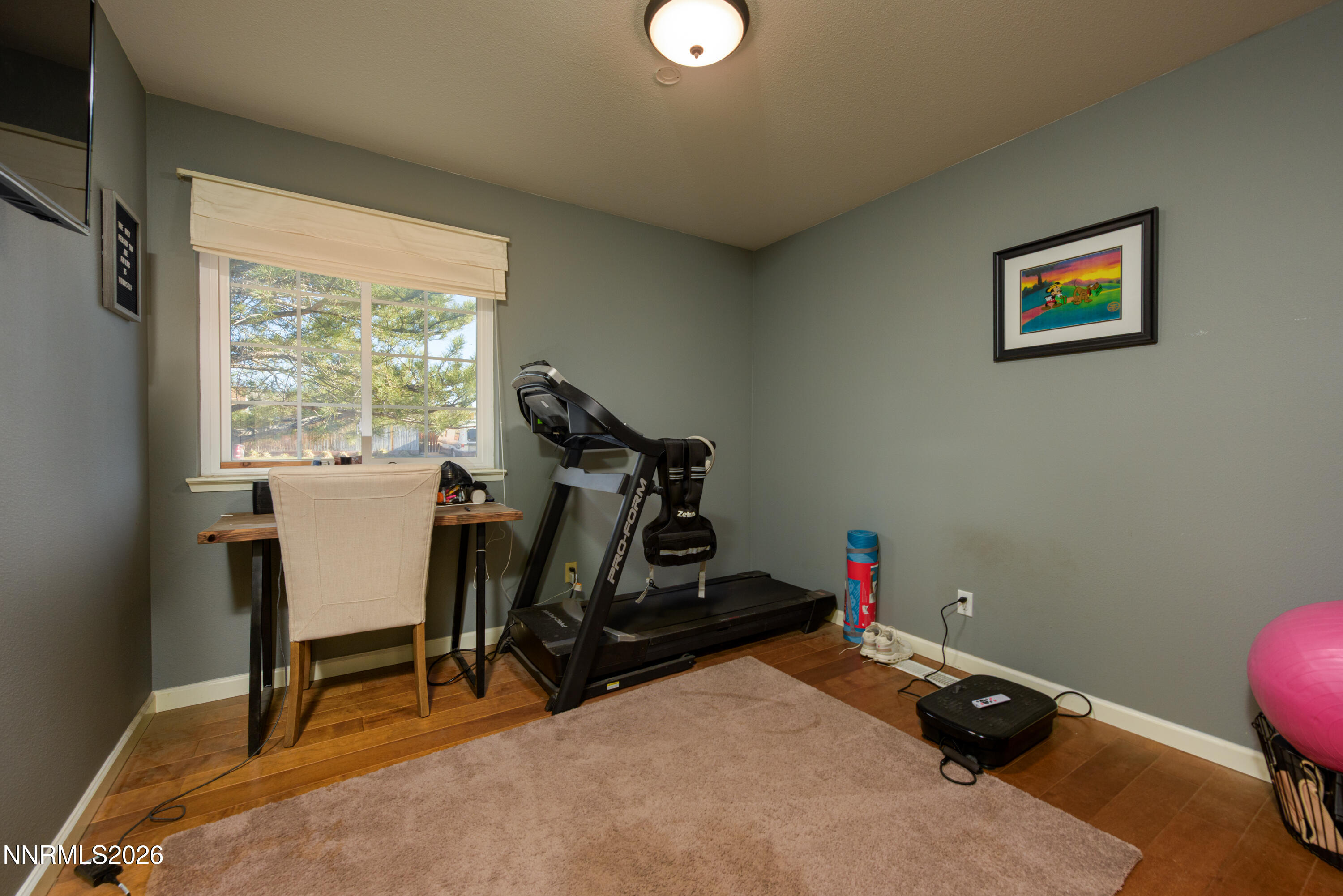 624 Victoria Way Gardnerville, NV 89460 - Photo 15 of 25 a view of a workspace with furniture and a window