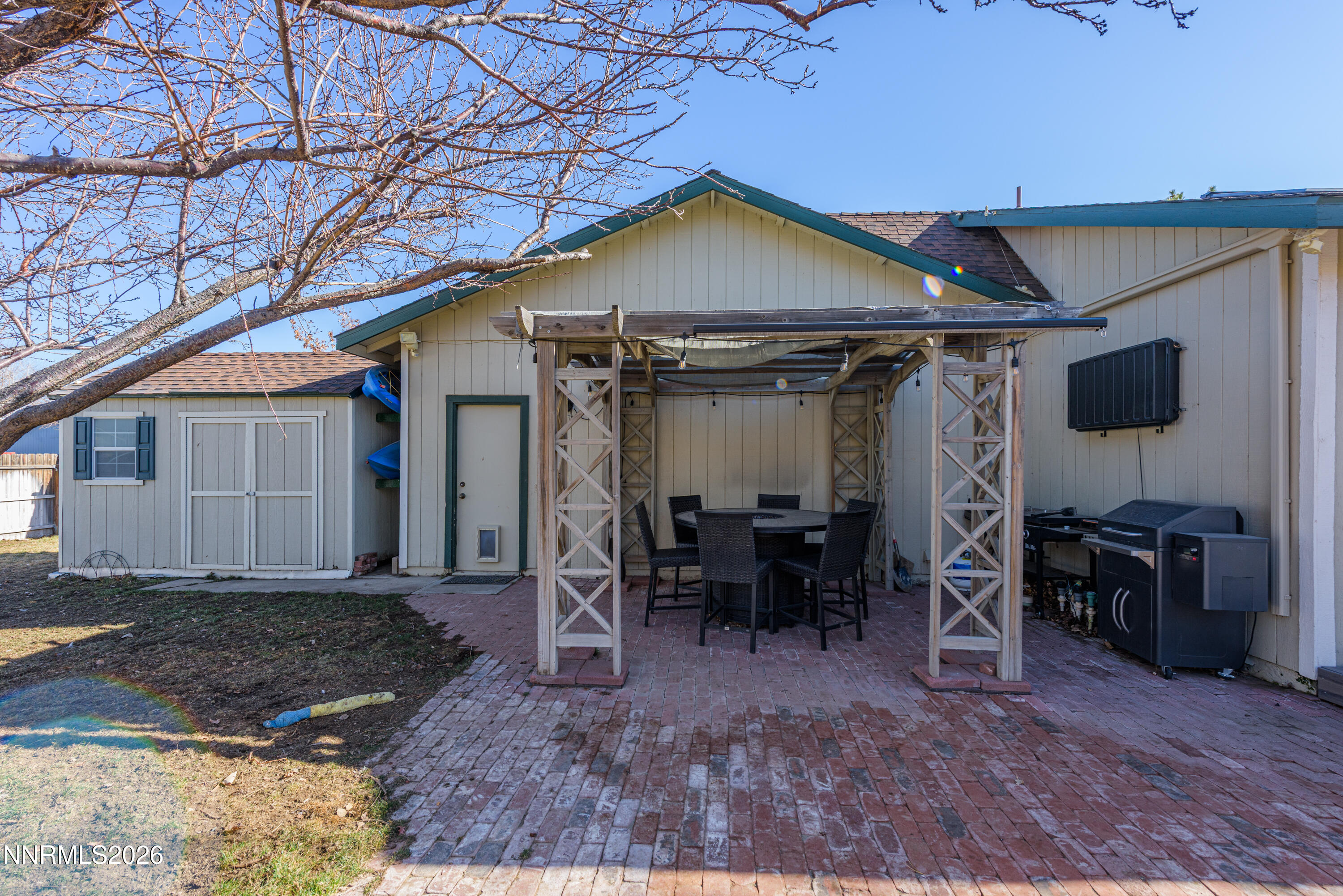 624 Victoria Way Gardnerville, NV 89460 - Photo 22 of 25 a view of a house with yard and chairs