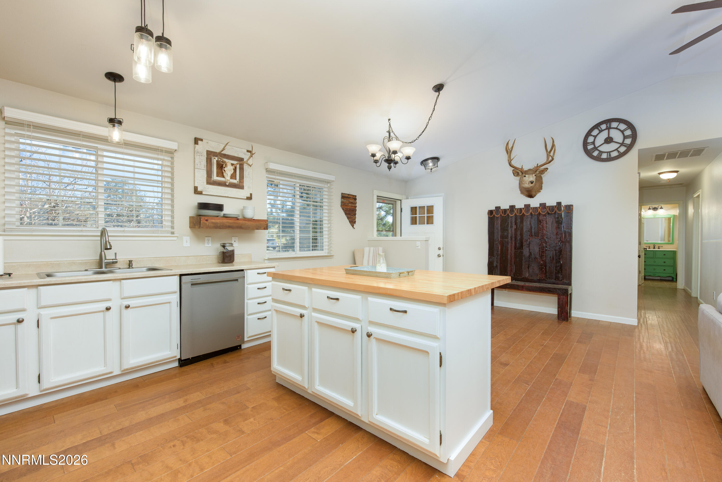 624 Victoria Way Gardnerville, NV 89460 - Photo 6 of 25 a kitchen with a sink cabinets and wooden floor