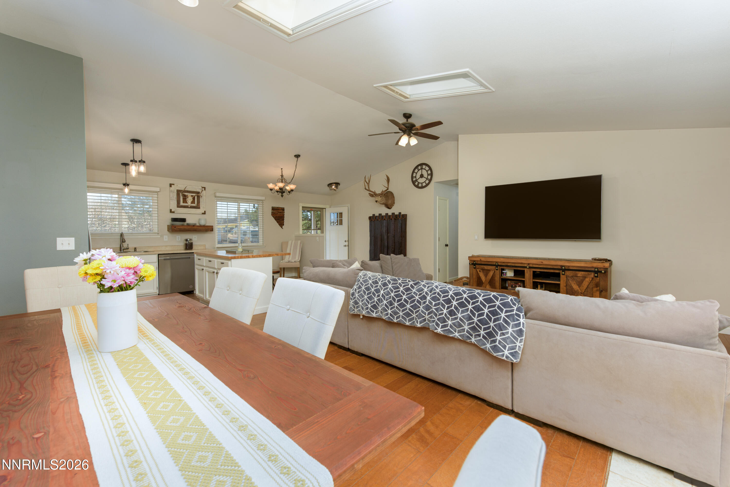 624 Victoria Way Gardnerville, NV 89460 - Photo 9 of 25 a living room with furniture and a flat screen tv