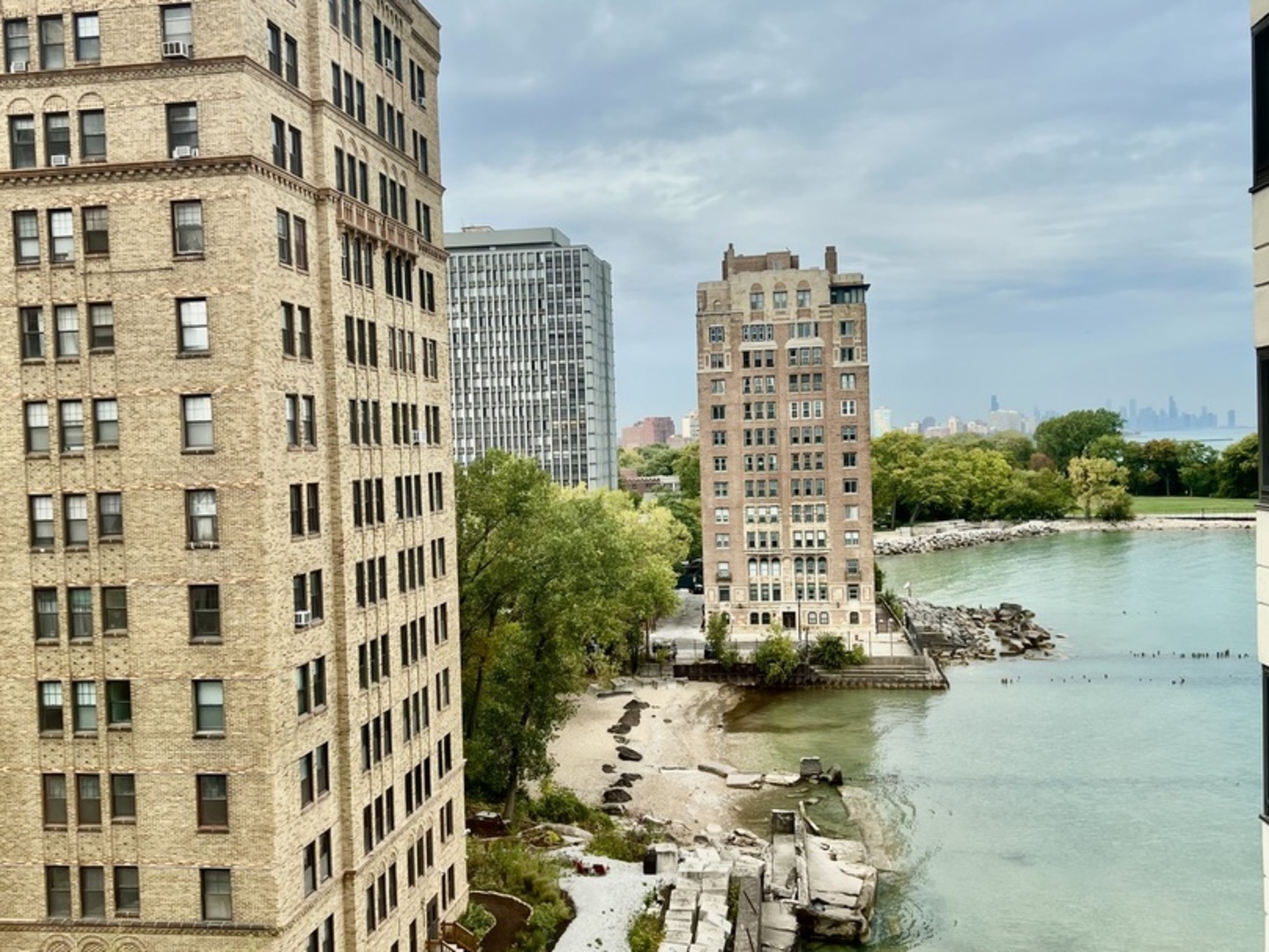 7337 South South Shore Drive, Unit 904 Chicago, IL 60649 - Photo 13 of 15 a view of a lake with building in front of it