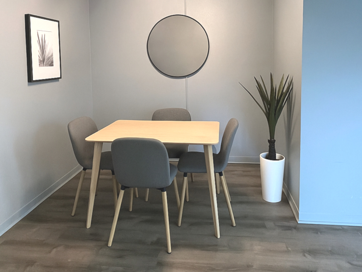7337 South South Shore Drive, Unit 904 Chicago, IL 60649 - Photo 4 of 15 a view of a dining room with furniture and a potted plant