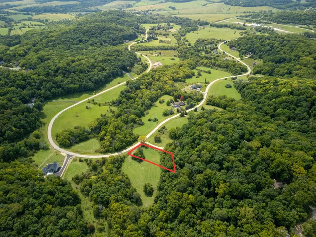 a view of a lake with a yard