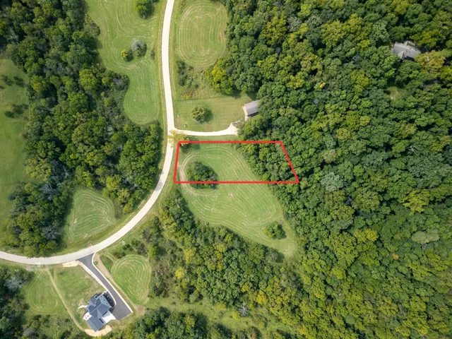 a view of a yard in a balcony